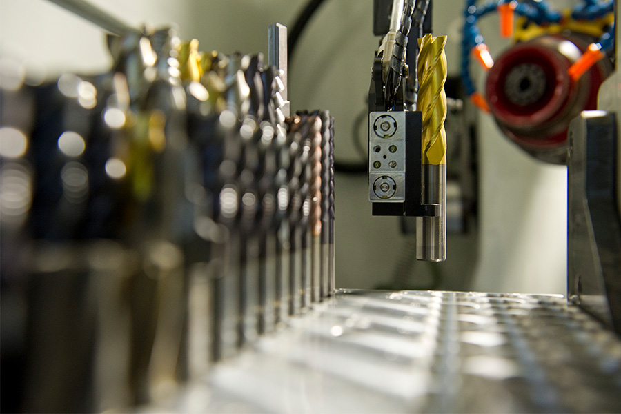Precision tool grinding close-up showing carbide tool sharpening context suitable for discussing edge quality, machine setup, and grinding process control.