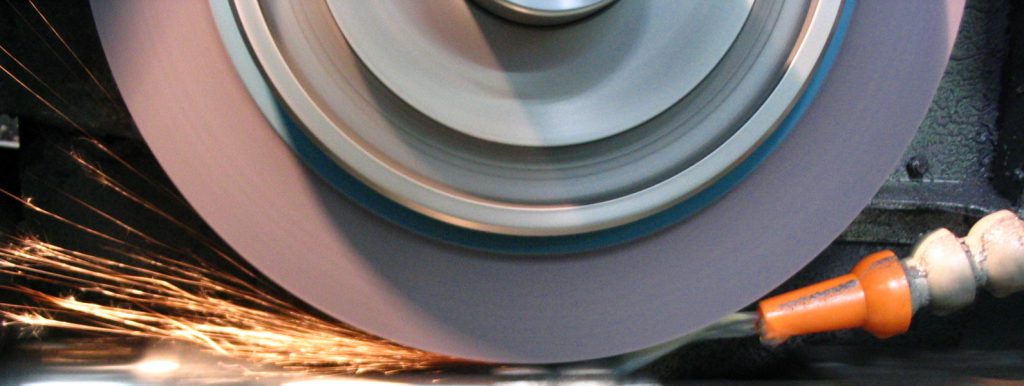 Grinding contact-zone vibration reference suitable for explaining chatter-mark formation and unstable wheel-work interaction.