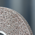Professional ceramic bond grinding wheel showing porous structure and abrasive grains